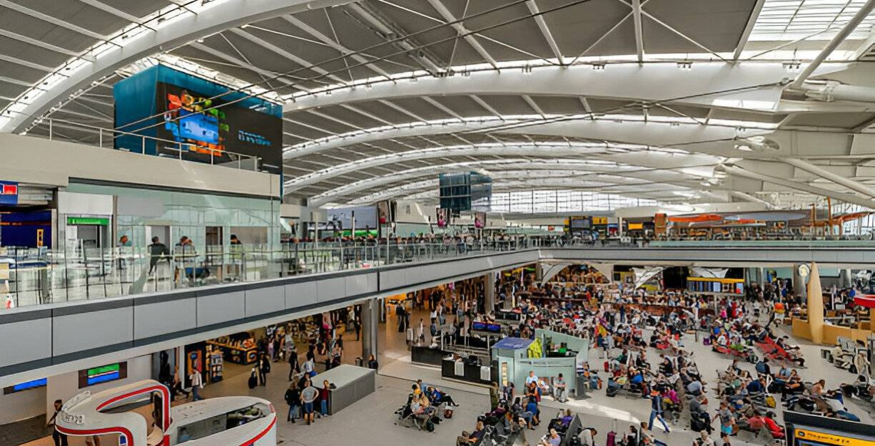 a busy terminal with travelers